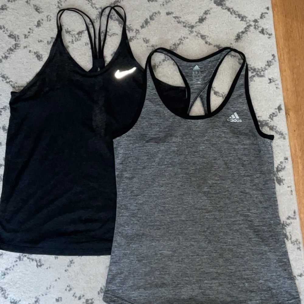 Set of 2 work out tanks…1 Nike Dri-Fit Black Tank & 1 Adidas Climate Grey tank.